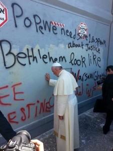 Pope Francis praying a separation wall in Palestine on May 25, 2014. (Photo credit: Pope Francis's Facebook page.).